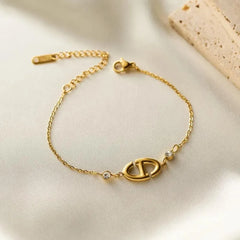 Gold Plated Oval CD Logo Charm Chain Bracelet