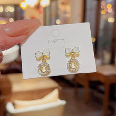 Elegant Bow Hollow Circle Drop Earrings β Each