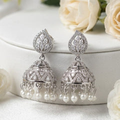 Silver-Toned Cubic Zirconia Jhumka Earrings with Pearl Danglers