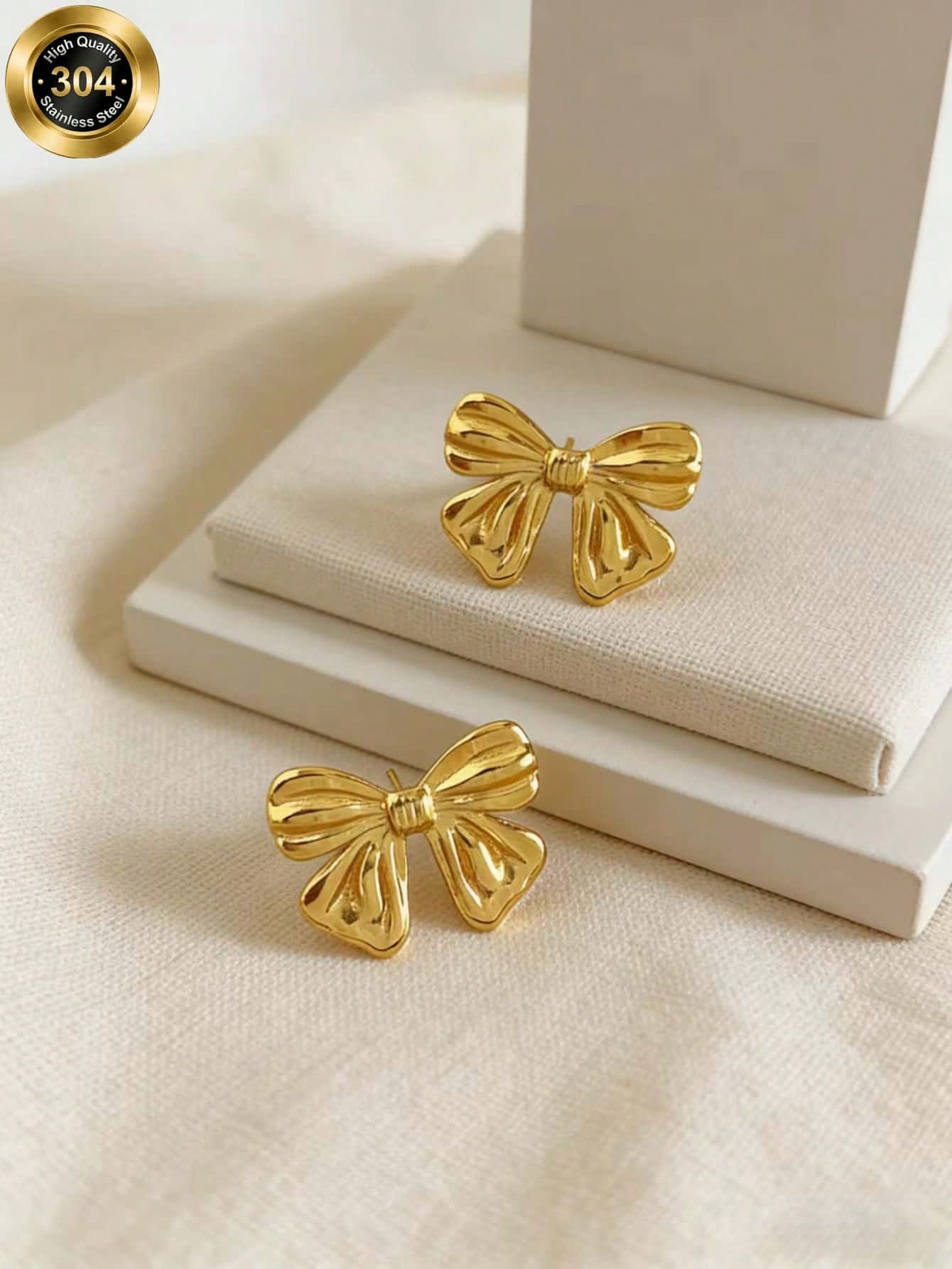 Stainless Steel Retro Texture Bow Earings - Each Pair