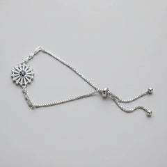 Silver Sunburst Evil Eye Bolo Bracelet with Black Center Stone – Adjustable Slider Chain