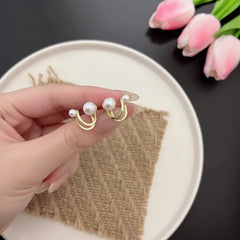U-Shape Pearl Huggie Earrings - Each