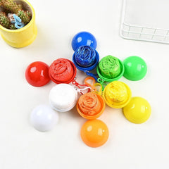 Portable Disposable Raincoat Keychain Compression Ball - Each