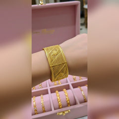 Gold cuff bangles